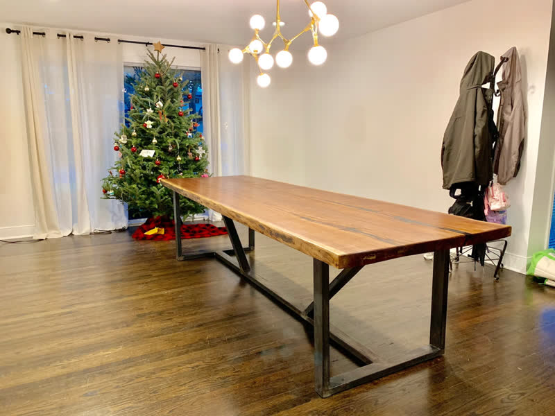 The same live-edge walnut table set for a family dining room