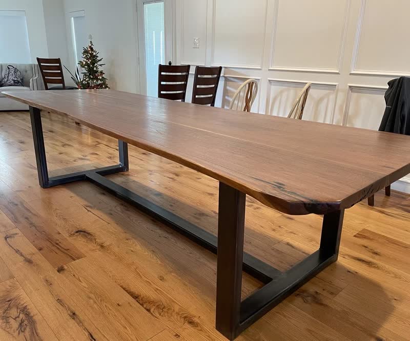 A live-edge walnut dining table delivered to a client's home